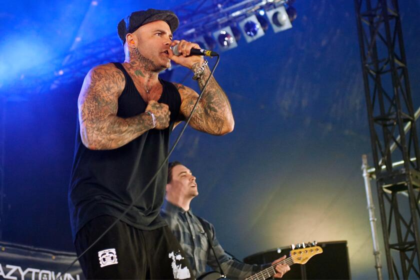 Seth Binzer of Crazy Town performs on stage at Download Festival at Donnington Park on June 15, 2014 in Donnington, UK.