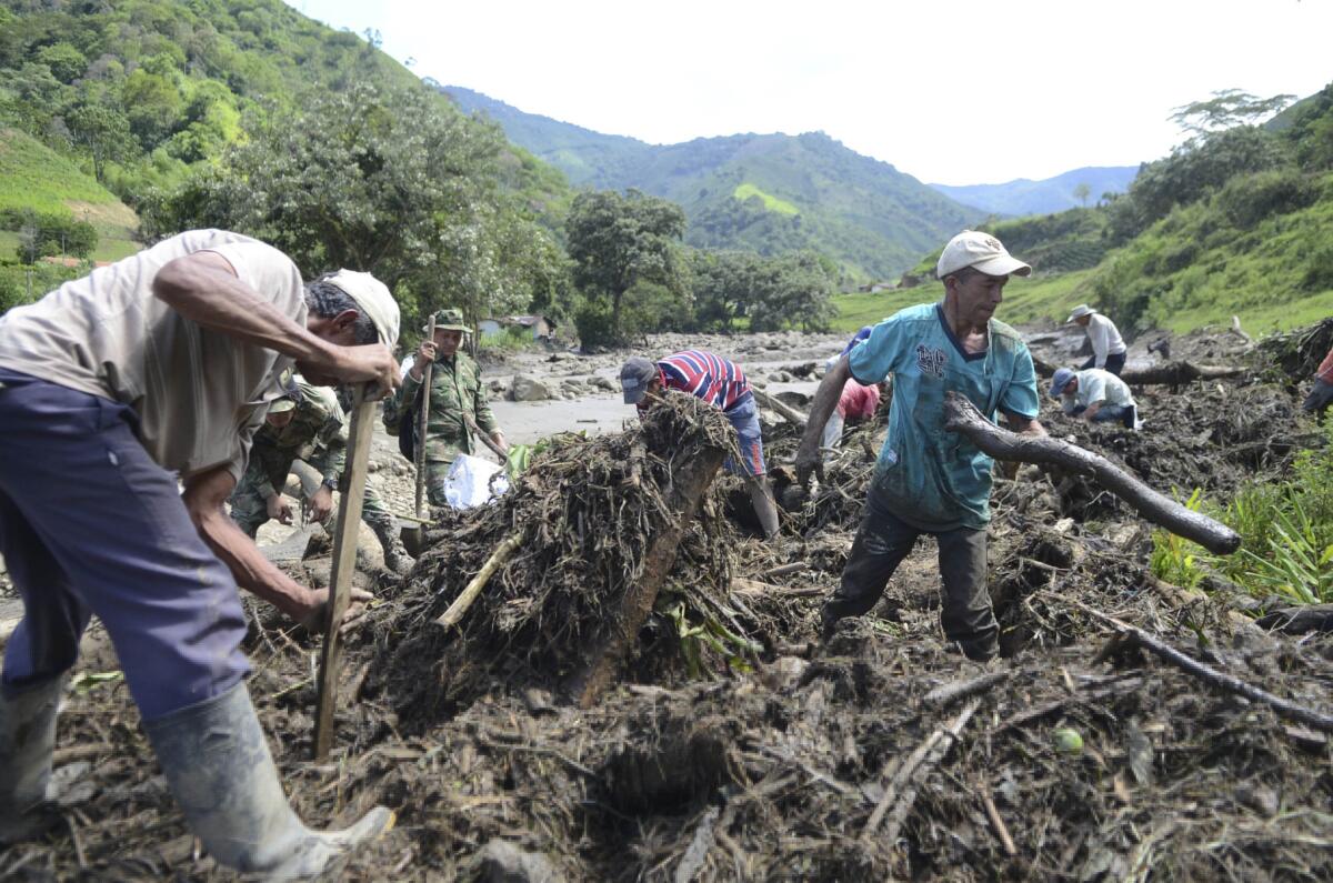 Residents look for survivors after and avalanche in Salgar, in Colombia's northwestern state of Antioquia, on May 18.