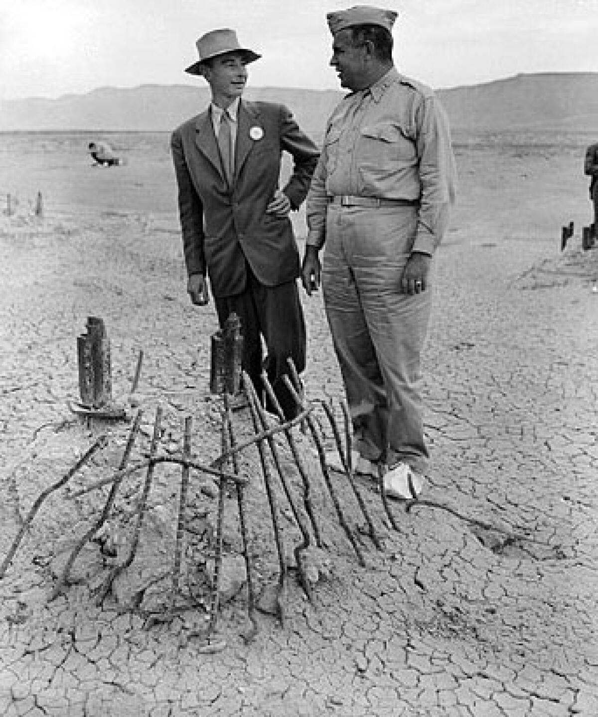 J. Robert Oppenheimer (left) and Manhattan Project boss 