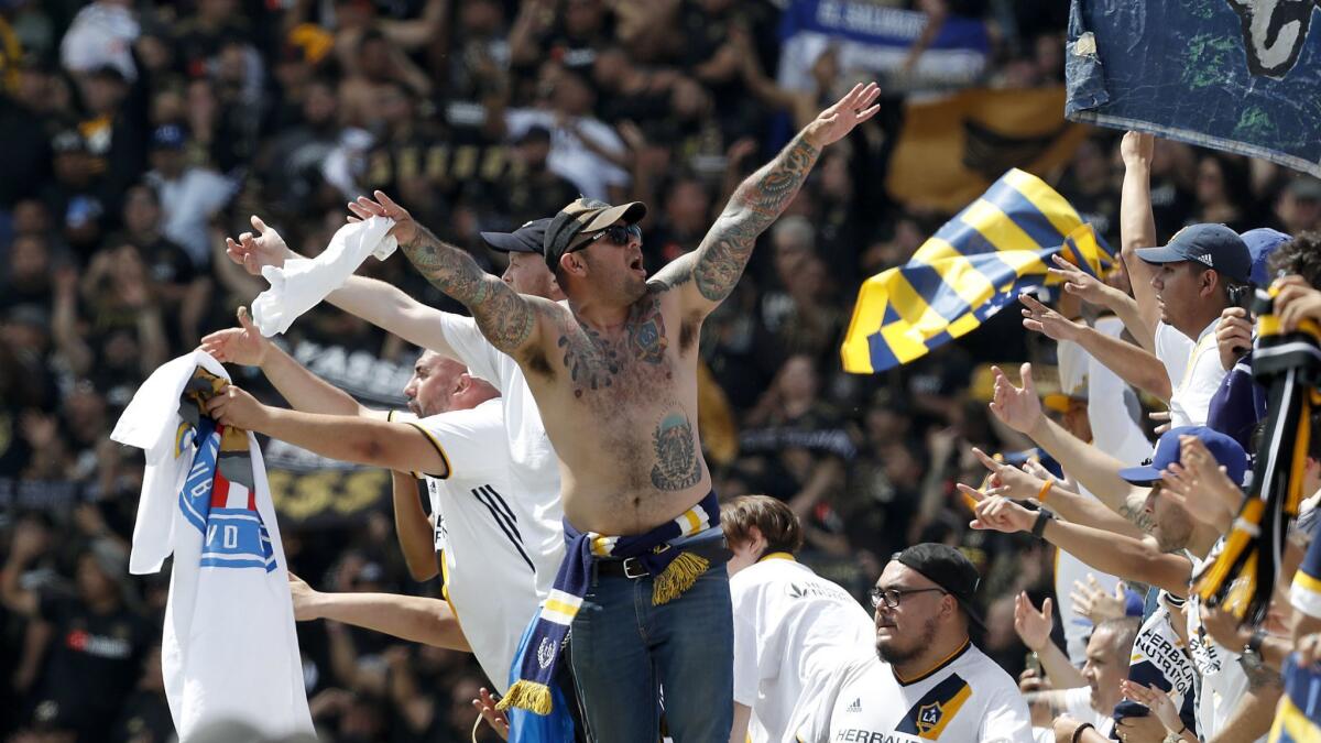 Galaxy fans celebrate a win over LAFC on March 31, 2018, in Carson.