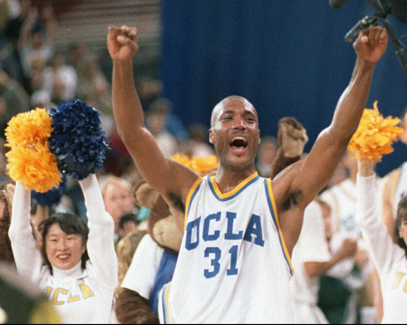 UCLA's Ed O'Bannon celebrates after the Bruins' win over Arkansas for the 1995 NCAA men's basketball title.