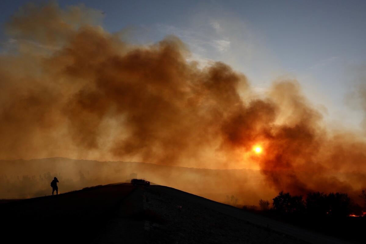 A brush fire burns in the Sepulveda Basin in 2019.