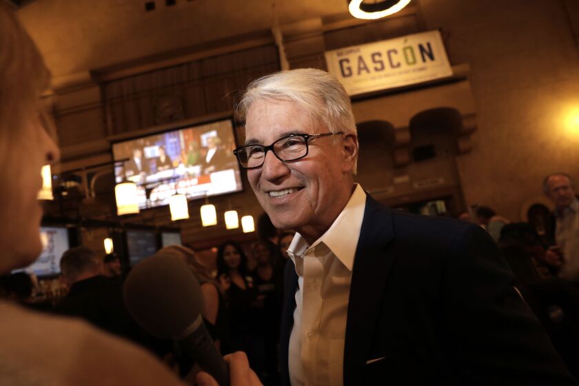 LOS ANGELES, CALIFORNIA-MARCH 3, 2020-LA District Attorney candidate George Gascon talks to media at Union Station for the election results on March 3, 2020. Gascon is the former District Attorney of San Francisco. Jamarrah Hayner (646-262-8044), she's the campaign manager. (Carolyn Cole/Los Angeles Times)
