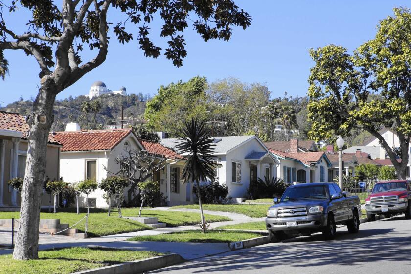 The Griffith Observatory overlooks homes in Los Feliz flats, in the 2000 North block of New Hampshire Avenue.