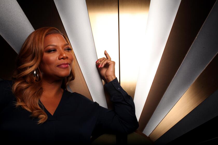 "The Queen Latifah Show" got off to a promising start Monday. She is pictured on the set of the show at Sony Pictures Entertainment in Culver City.