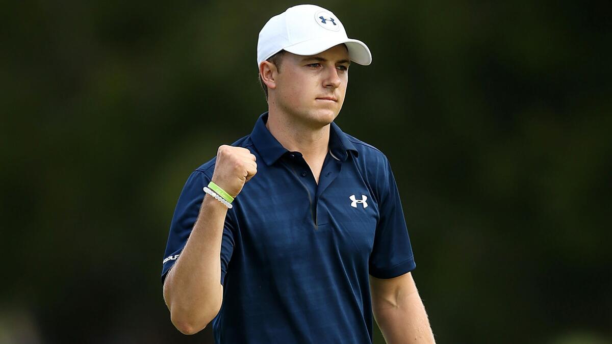 Jordan Spieth reacts after holing the winning putt at the Australian Open on Sunday.