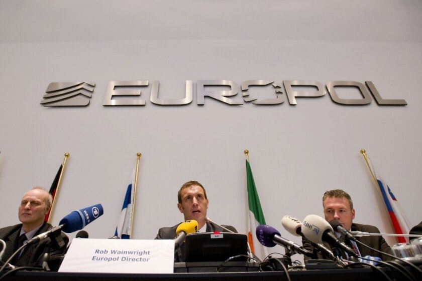Europol chief Rob Wainwright, center, discussing a probe of suspected fixing of soccer matches at a news conference Monday.