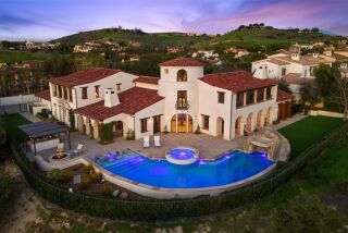 Built in 2010, the four-story mansion includes a decked-out pool complete with a slide, waterfall and rock grotto.