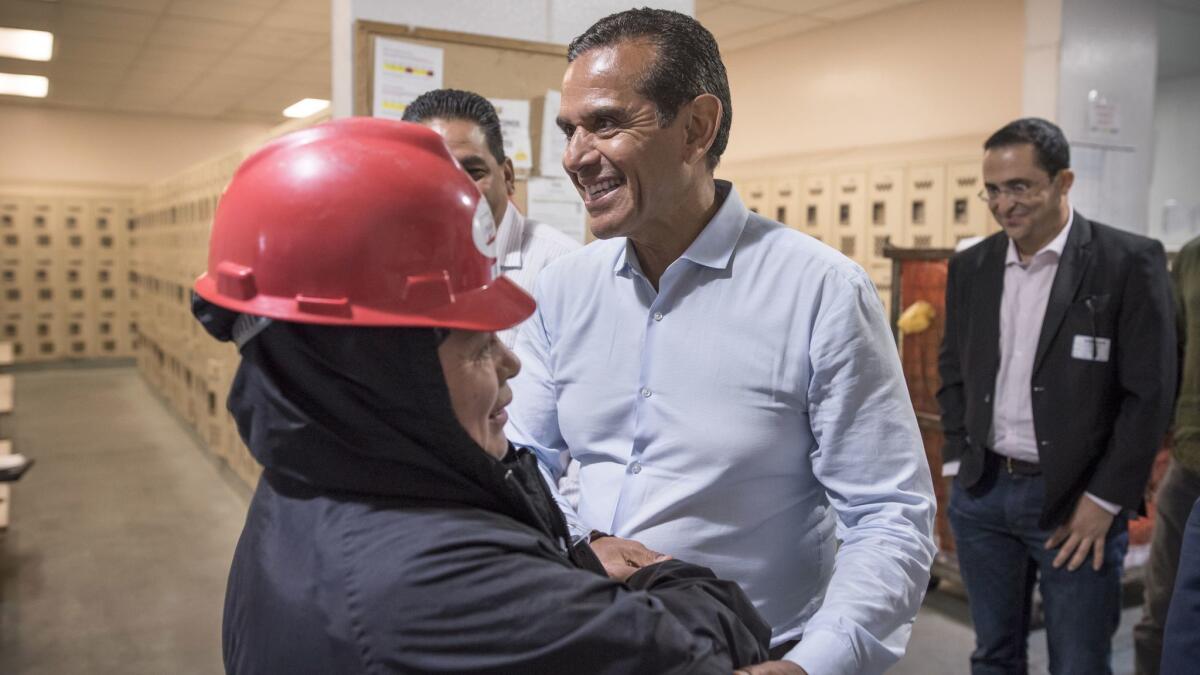 Antonio Villaraigosa greets workers at the Organic Girl lettuce processing plant in Salinas during a day on the California gubernatorial campaign trail