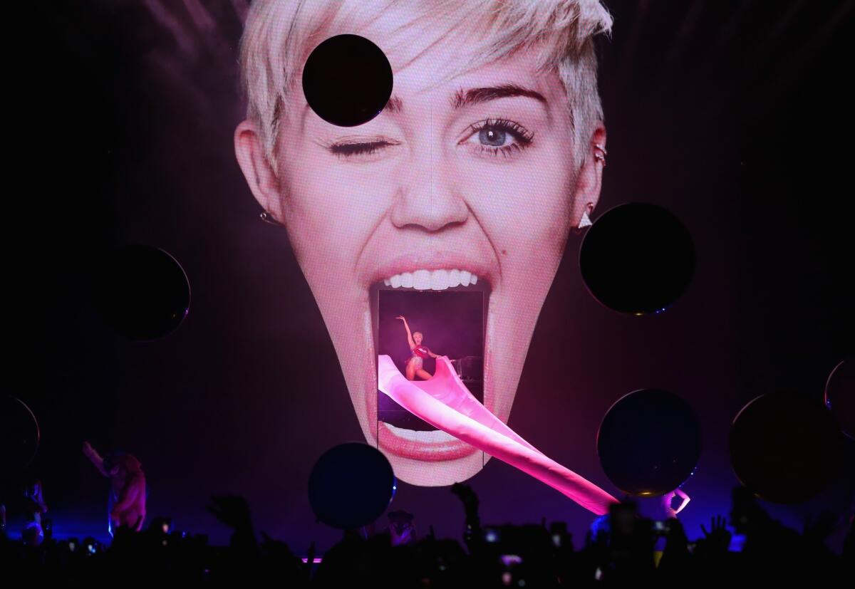 Miley Cyrus performs live on stage at 02 Arena on May 6, 2014 in London, England.