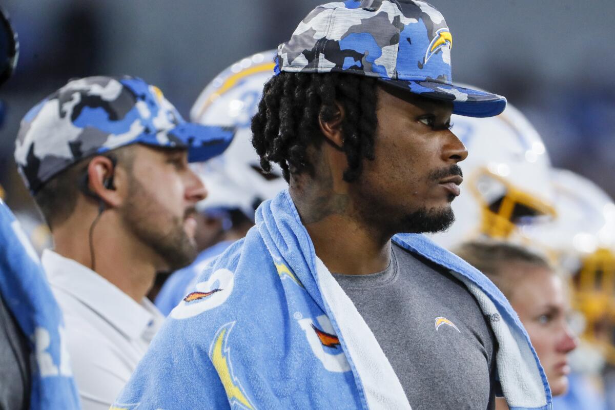 Chargers safety Derwin James Jr. looks on from the sidelines during a preseason game against the Rams at SoFi Stadium.