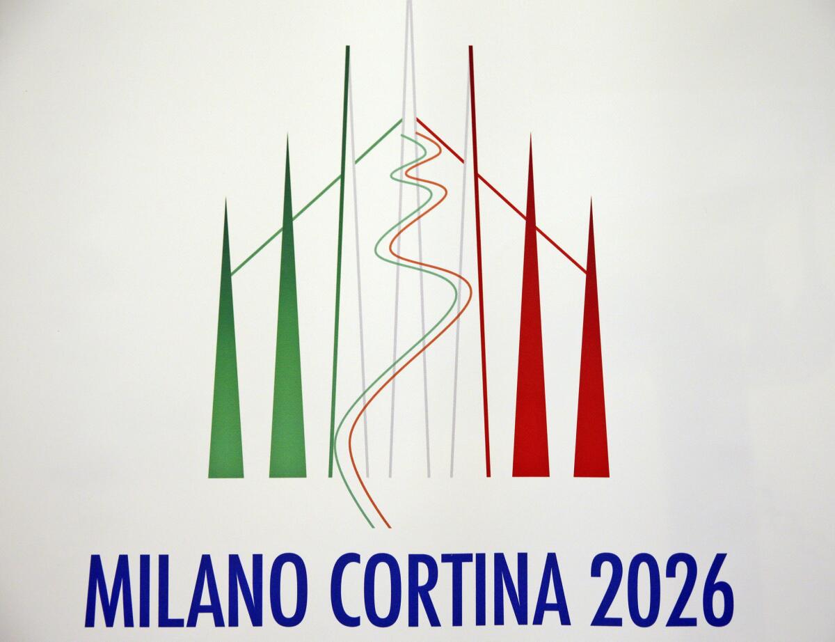 The Milan-Cortina Olympic logo is shown during a news conference April 6 in Milan, Italy,