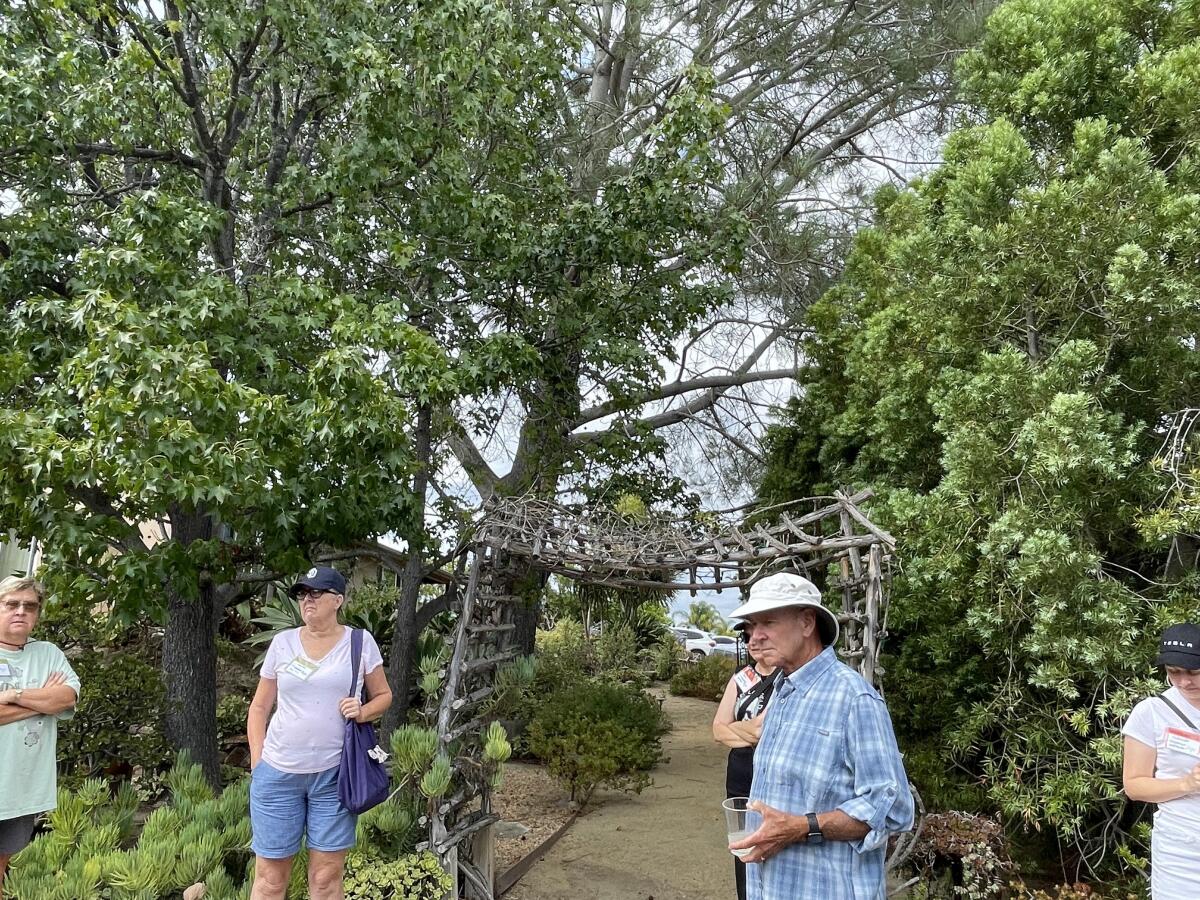 The club visited the McCaws' garden.