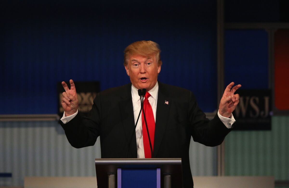 Donald Trump makes a point during the Republican presidential debate in Milwaukee.