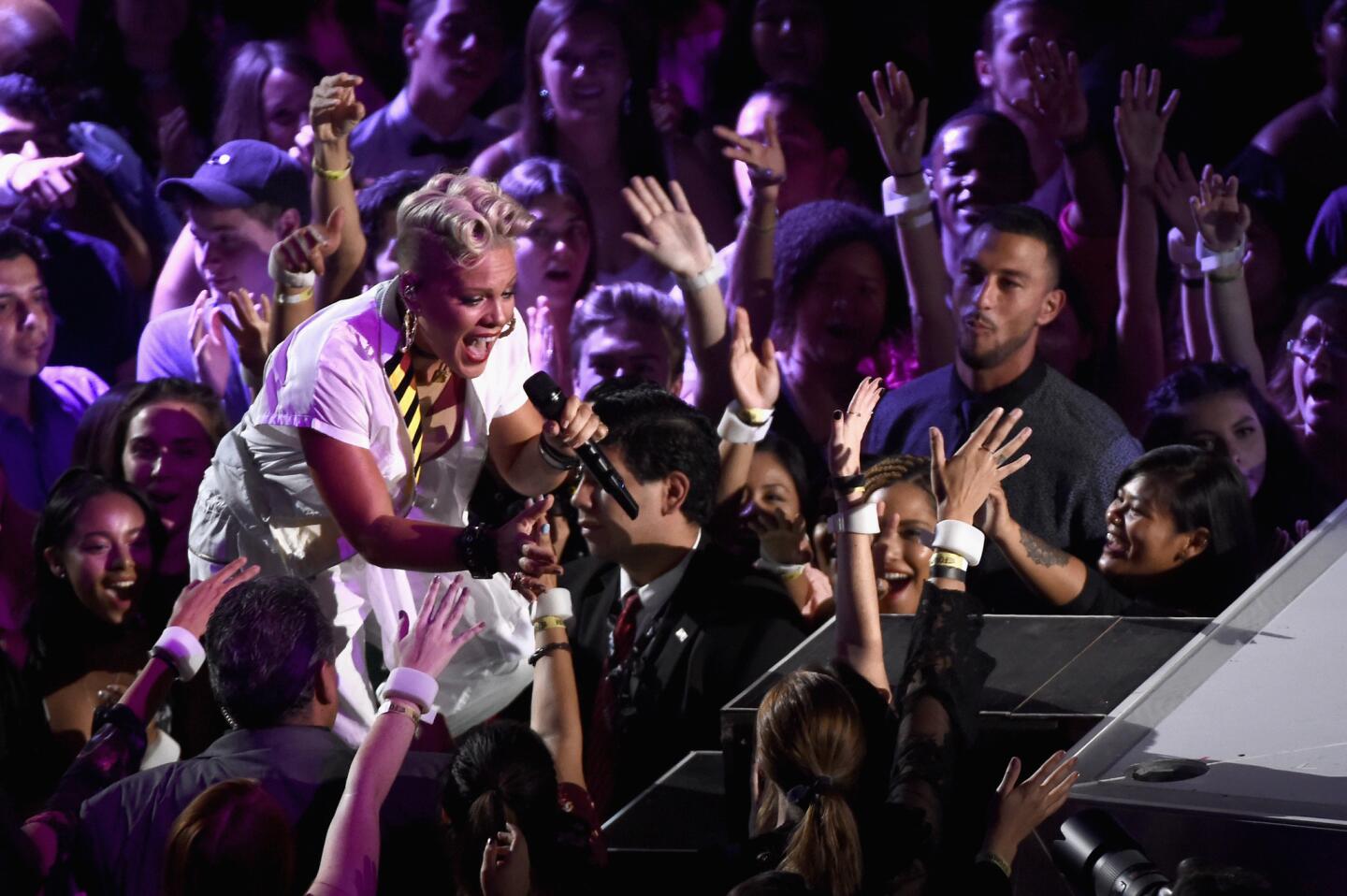 Pink interacts with the crownd during her performance.