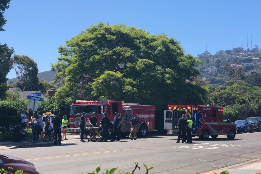Susan Wiczynski took this photo of fire crews responding to a June 13 accident involving a car and three pedestrians. 