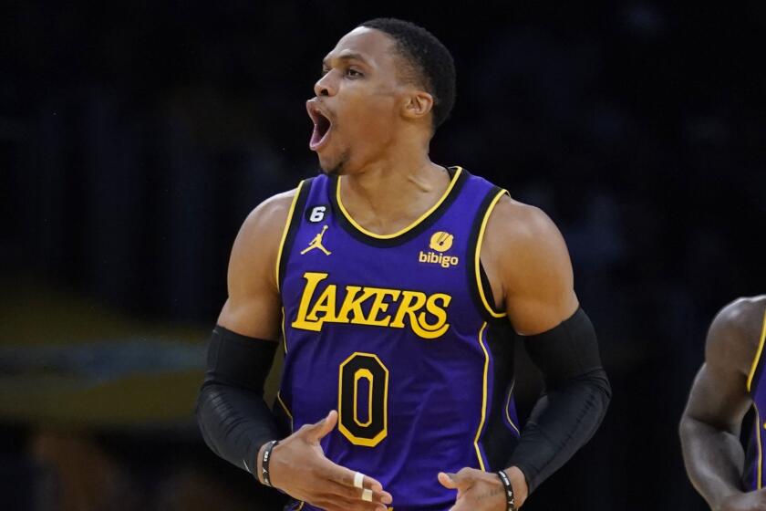 Los Angeles Lakers guard Russell Westbrook (0) reacts after scoring against the Utah Jazz.
