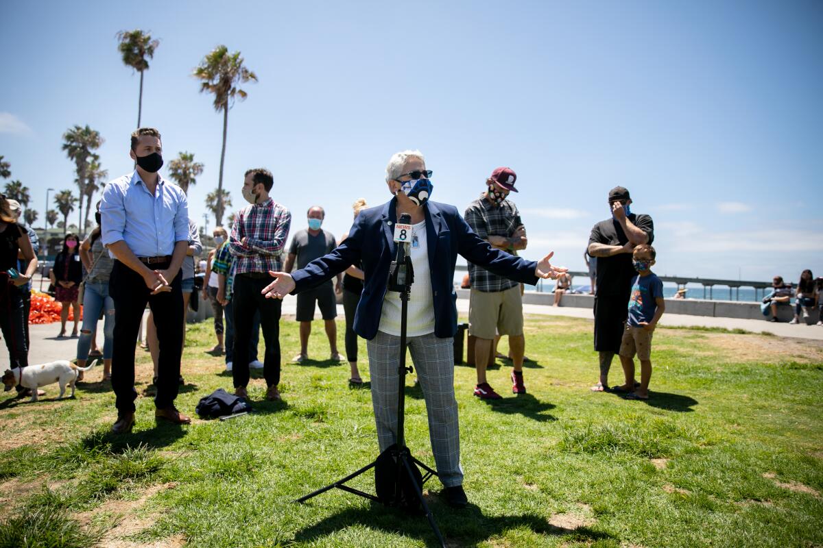 San Diego City Councilmember Jennifer Campbell speaks to the press at Ocean Beach Veterans Plaza on Tuesday.