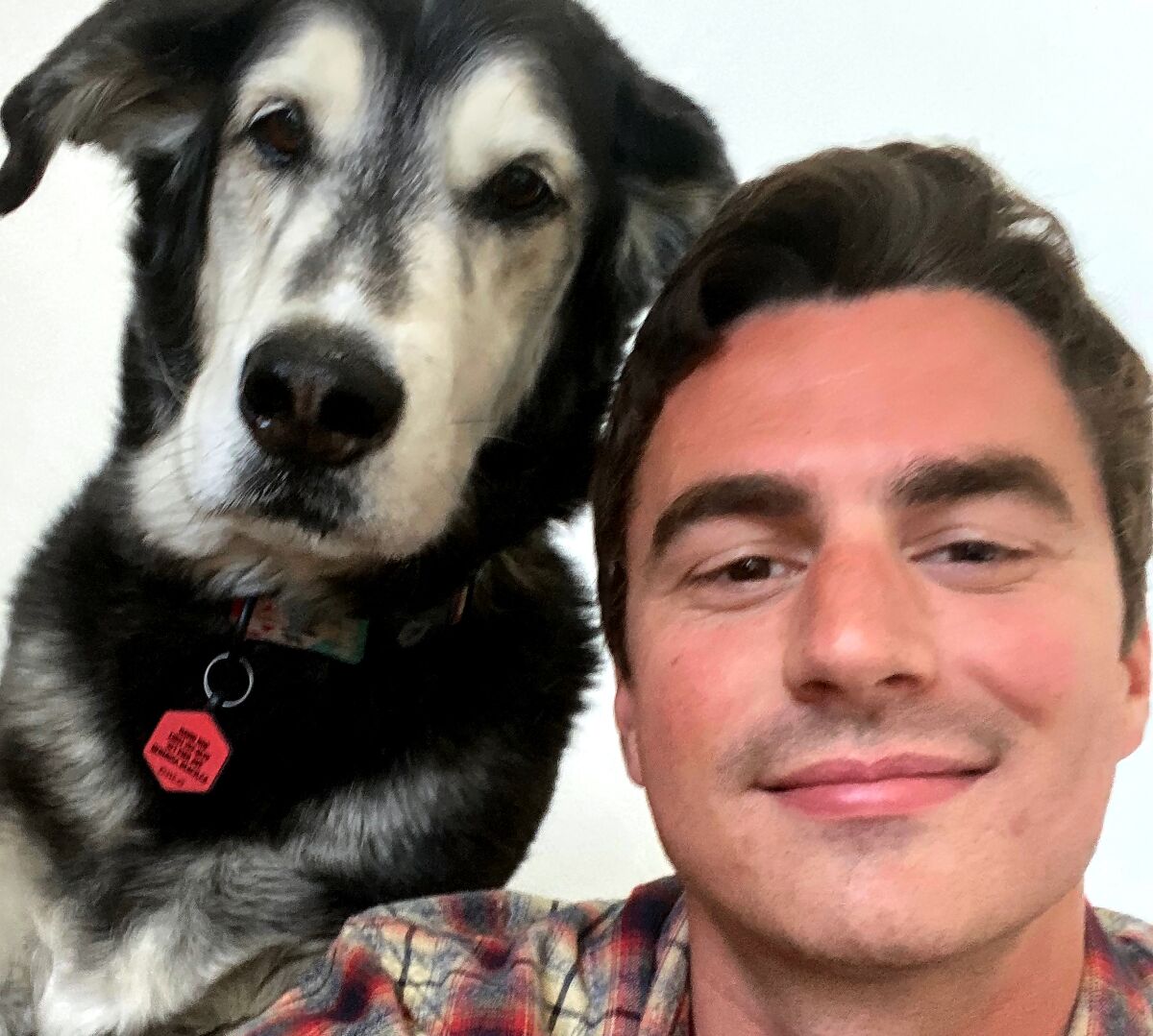 David Roe with his dog Kobe