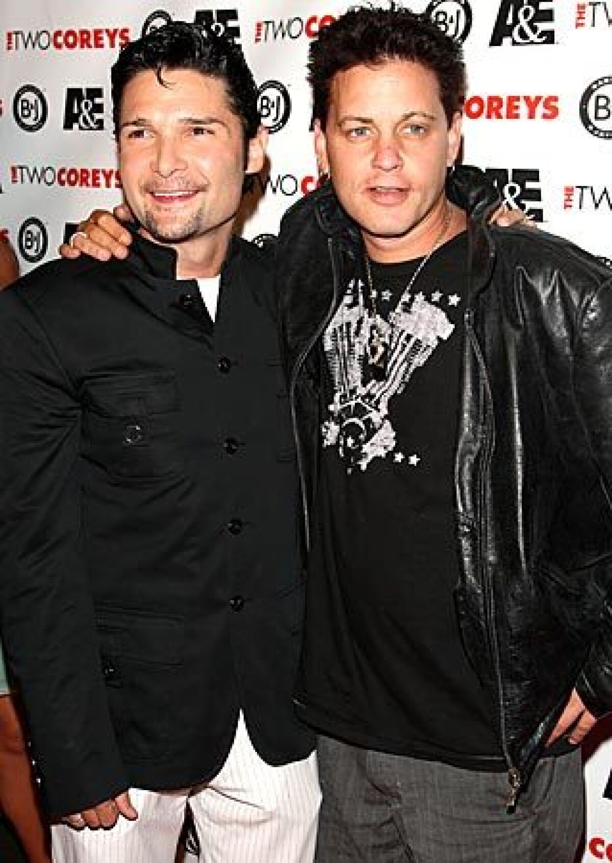 Corey Feldman, left, and Corey Haim attend the premiere of "The Two Coreys," an A&E reality show, in 2007.