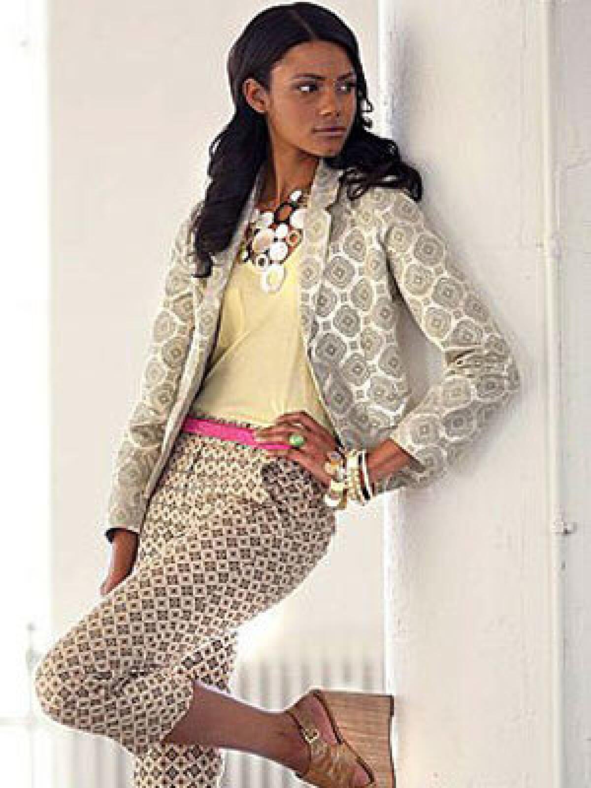 HOLIDAY IN THE SUN: J. Crew blazer, $250 at jcrew.com; Talbots pants, $49 at talbots.com; Bordeaux tank top, $46 at Sugar, Westlake Village; Emily Noelle belt, $187 at Intermix; H&M necklace, $14.90, and bracelet, $6.90 at H&M Beverly Center; Jessica Elliot ring, $38 at www.skinnystyle.com; Nine West shoes, $89 at ninewest.com.