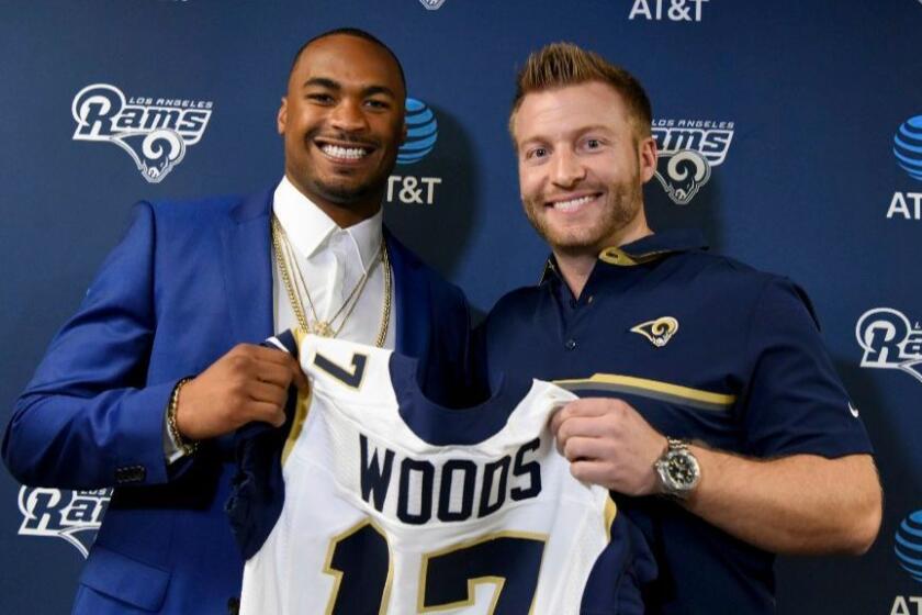 Rams receiver Robert Woods poses with Coach Sean McVay during his introductory news conference on March 10.
