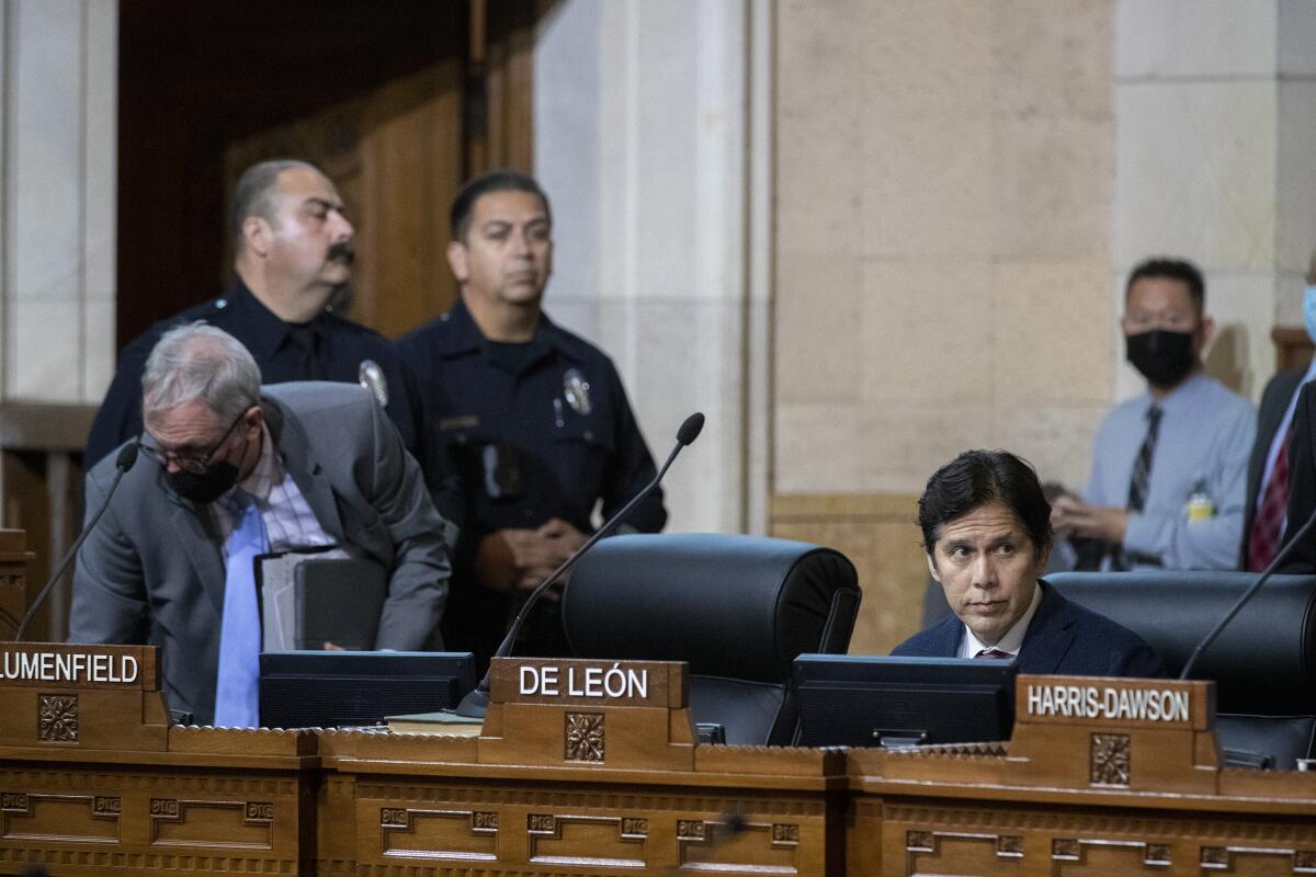 Kevin De León sitting on the dais at City Hall