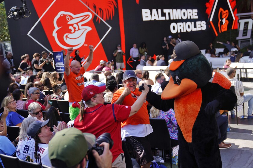 The Baltimore Orioles mascot salutes fans during the 2022 MLB draft at LA Live on Sunday.