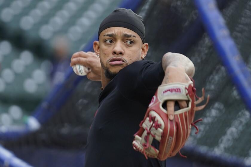 Arizona Diamondbacks' Ketel Marte warms up before a baseball game against the Chicago Cubs, Thursday, Sept. 7, 2023, in Chicago. (AP Photo/Erin Hooley)