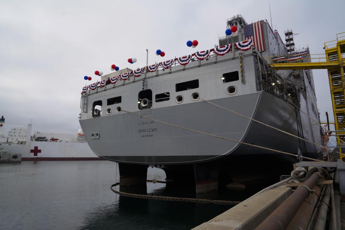 The Navy oiler John Lewis was christened Saturday at the General Dynamics-NASSCO shipyard.