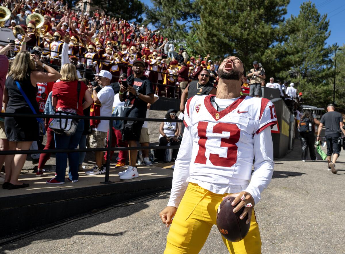 Caleb Williams lets out a scream after USC's 48-41 win over Colorado at Folsom Field in Boulder on Saturday.