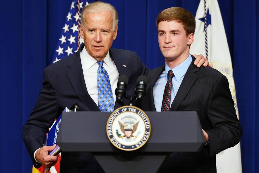 Vice President Joe Biden with Stephen Barton, who was injured in the mass shooting at an Aurora, Colo., movie theater.