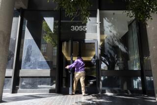 A person enters the building where is located the office of The TransLatin@ Coalition in Los Angeles, California, USA, 05 April 2024.