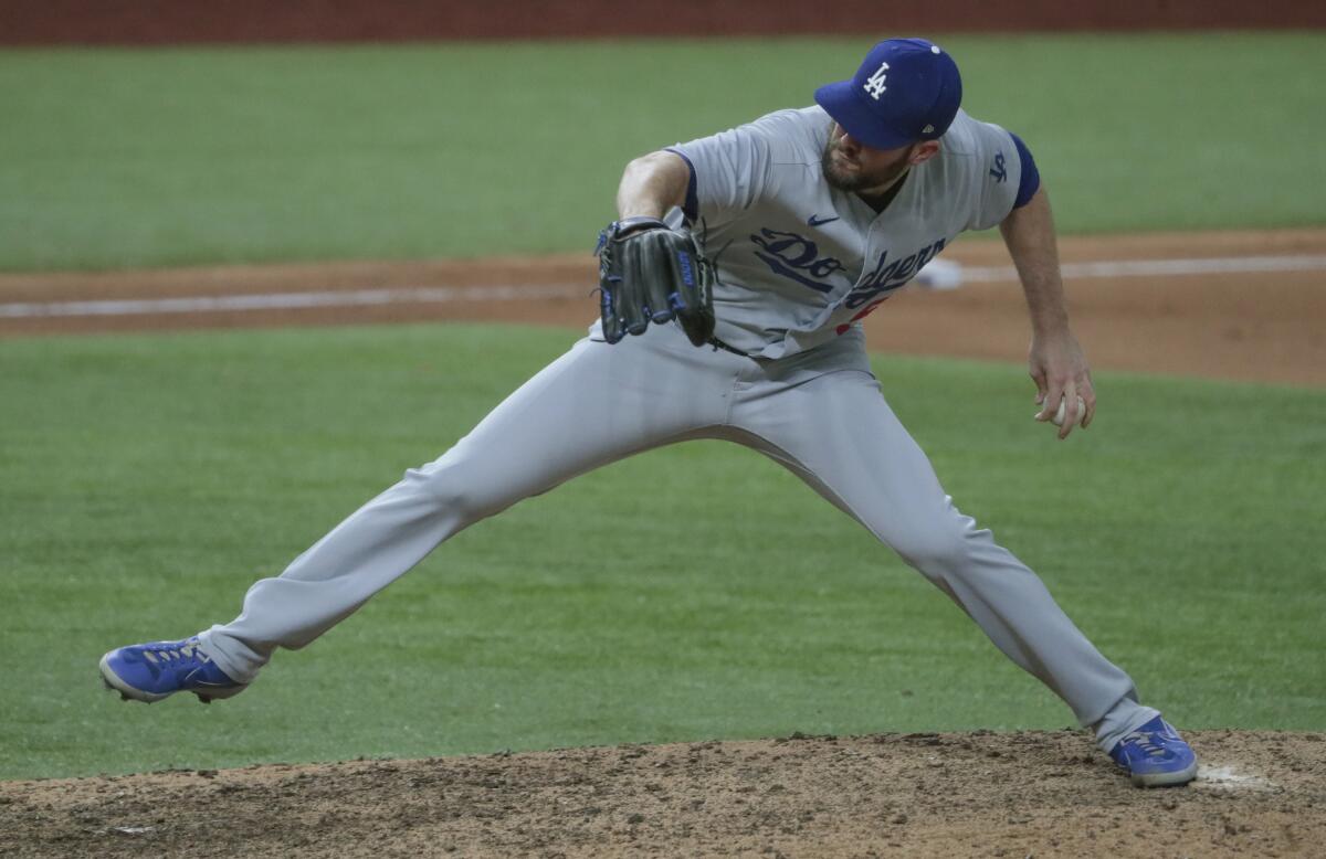The Dodgers' Alex Wood pitches during the NLCS.