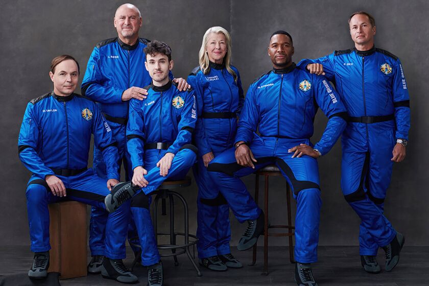 This photo provided by Blue Origin shows, from left: Dylan Taylor, Lane Bess, Cameron Bess, Laura Shepard Churchley, Michael Strahan and Evan Dick. The six are scheduled to be launched into space. (Courtesy of Blue Origin via AP)