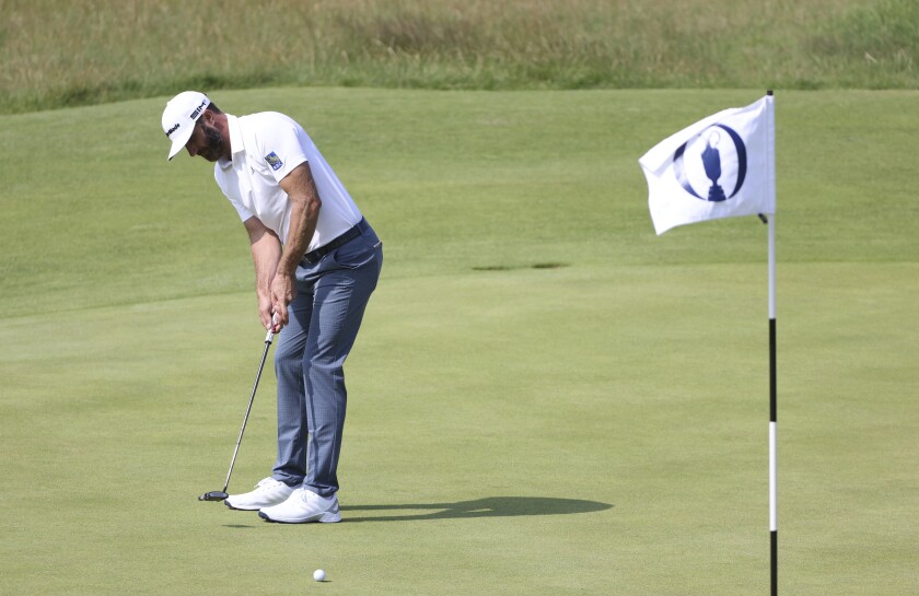 United States' Dustin Johnson putts on the 16th green during a practice round for the British Open Golf Championship at Royal St George's golf course Sandwich, England, Tuesday, July 13, 2021. The Open starts Thursday, July, 15. (AP Photo/Ian Walton)