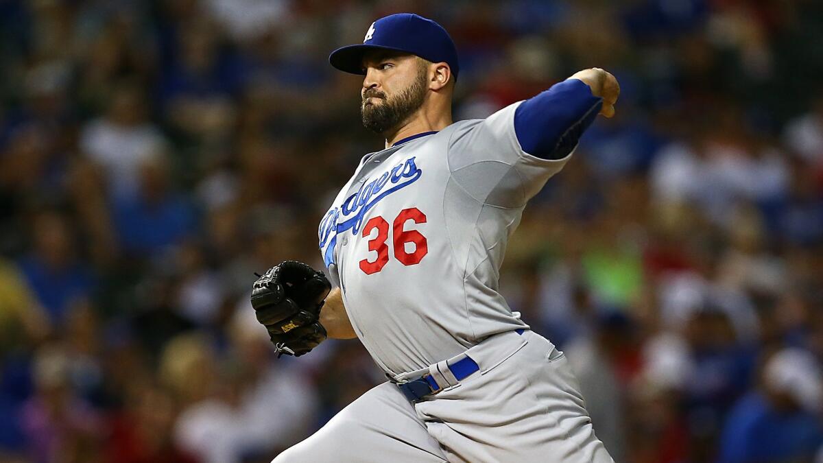 Dodgers reliever Adam Liberatore delivers a pitch during a game against the Texas Rangers on June 15.