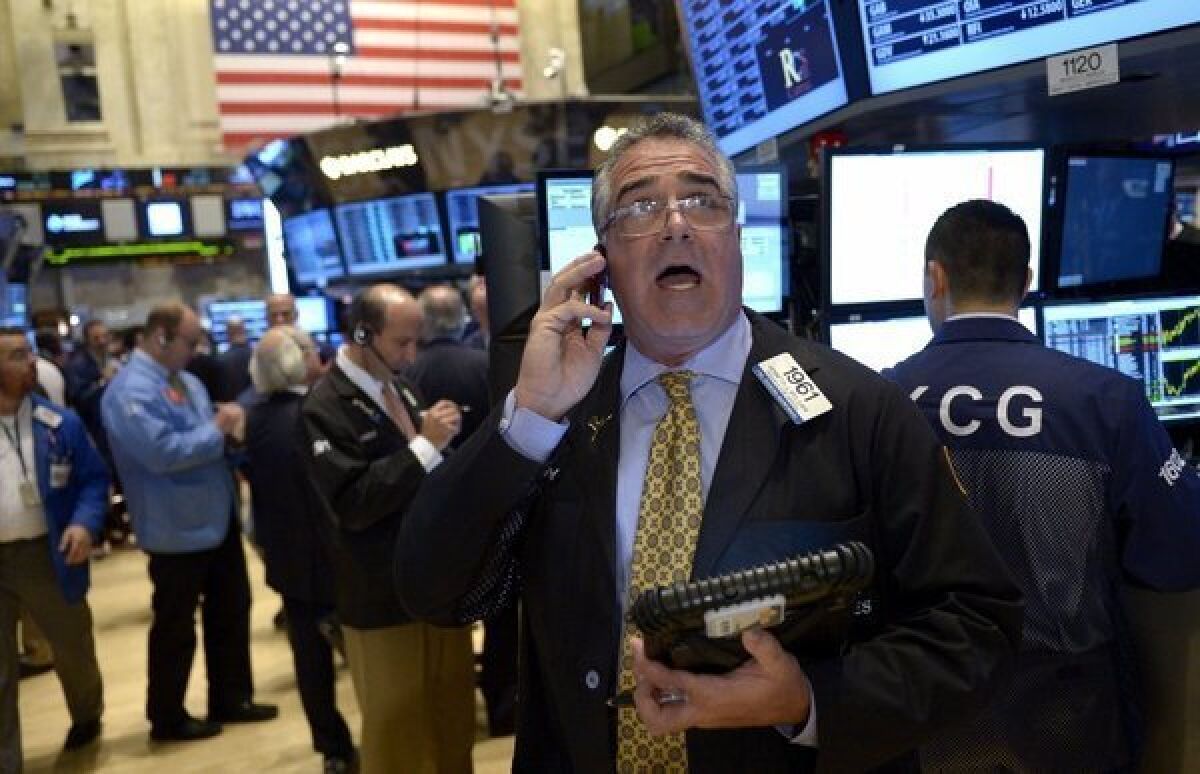 A trader on the floor of the New York Stock Exchange.