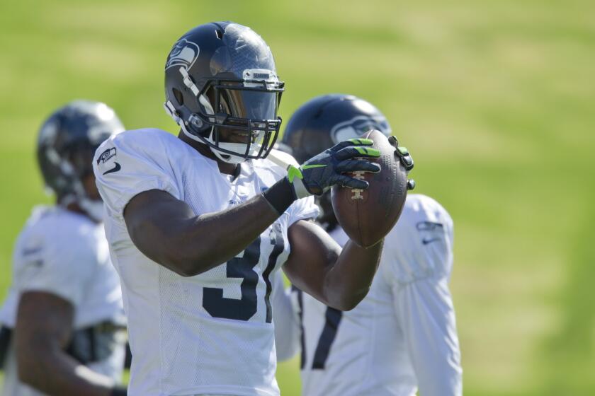 Safety Kam Chancellor practiced with the Seahawks on Wednesday for the first time after holding out over a contract dispute.
