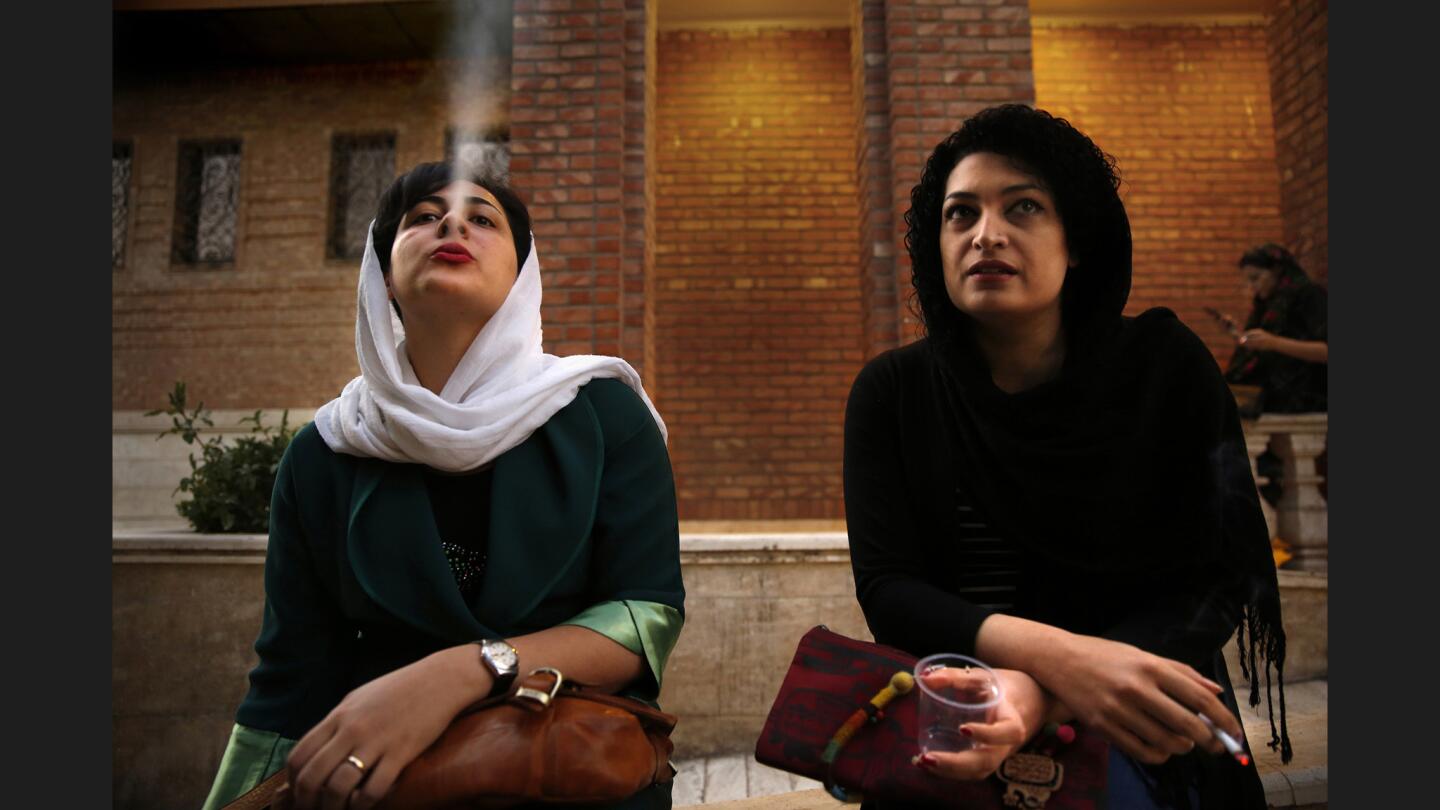 Before seeing a local production of "Ivanov" by Russian playwright Anton Chekov, women share a cigarette, a habit once frowned upon. Middle-class Iranians are increasingly finding ways to express their individuality while gradually expanding the boundaries of what the mullahs deem acceptable behavior.