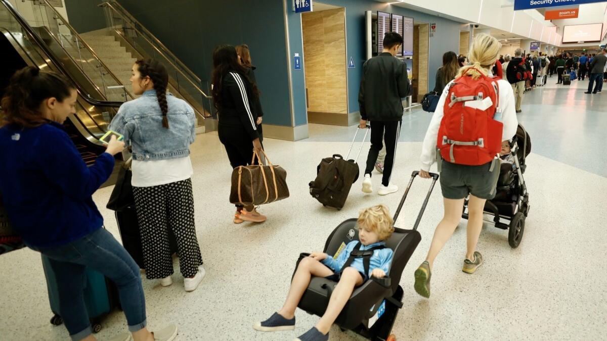 About 2.8 million are expected each day this summer at U.S. airports.