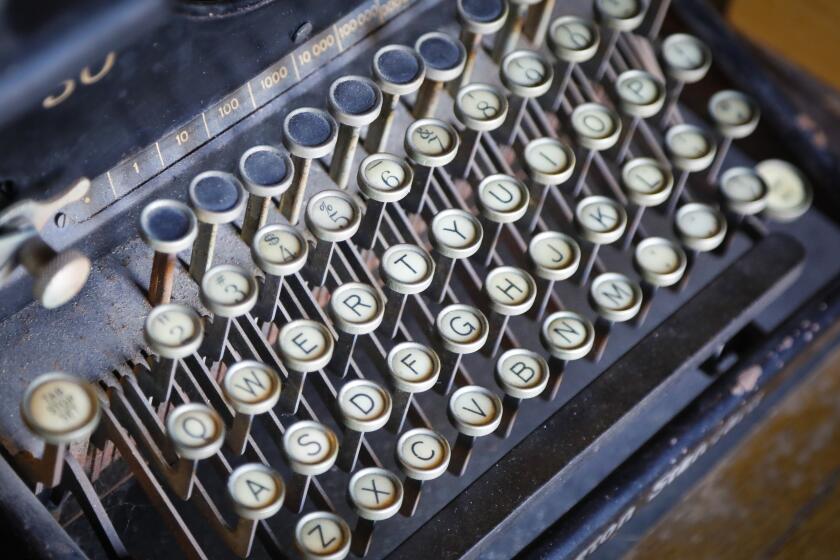 An old Remington typewriter is one of the many items at Lhooq Books, a funky vintage bookstore in Carlsbad Village. Sean Christopher, the owner recently received a 60-day eviction notice for both the shop and the adjoining house where he has raised his son, alone. He's hoping to achieve a stay of eviction on the property long enough to sell off his book inventory and find a new space without going bankrupt and ending up homeless with his son. Photographed October 11, 2019, in Carlsbad, California.