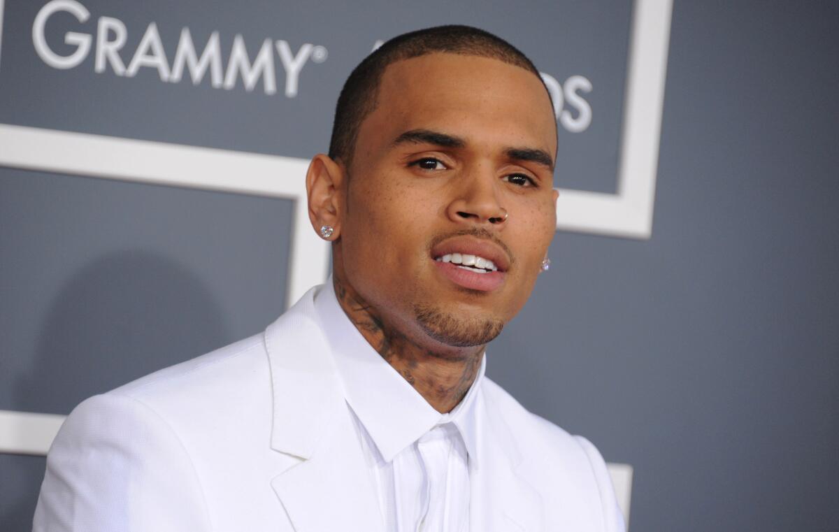 Chris Brown arrives at the 55th annual Grammy Awards in Feb. 2013, in Los Angeles. Brown was in L.A court on Wednesday and ordered to rehab.