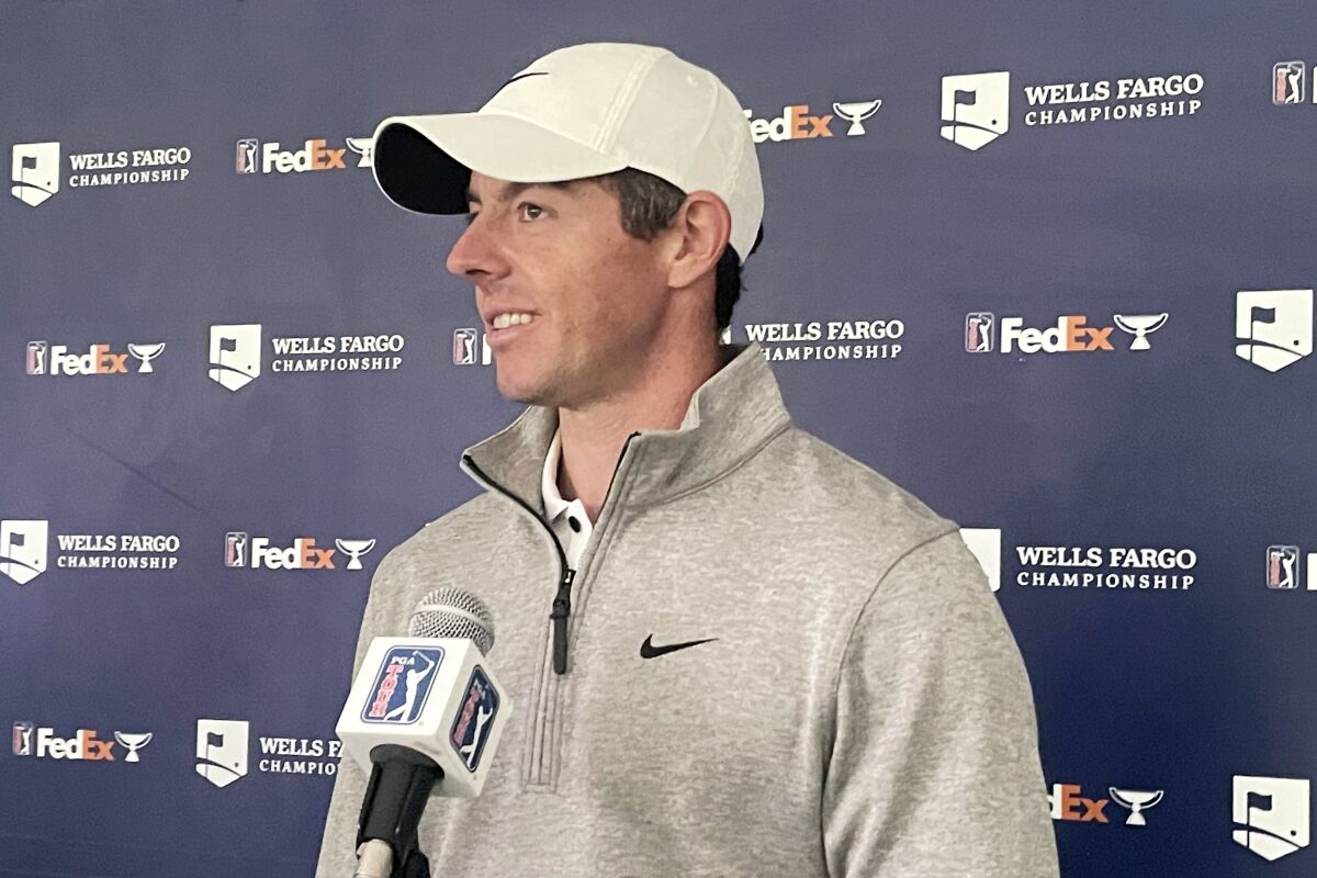 Rory McIlroy speaks to reporters at the Wells Fargo Championship golf tournament at TPC Potomac at Avenel Farm, Wednesday, May 4, 2022, in Potomac, Md. (AP Photo/Ben Nuckols)