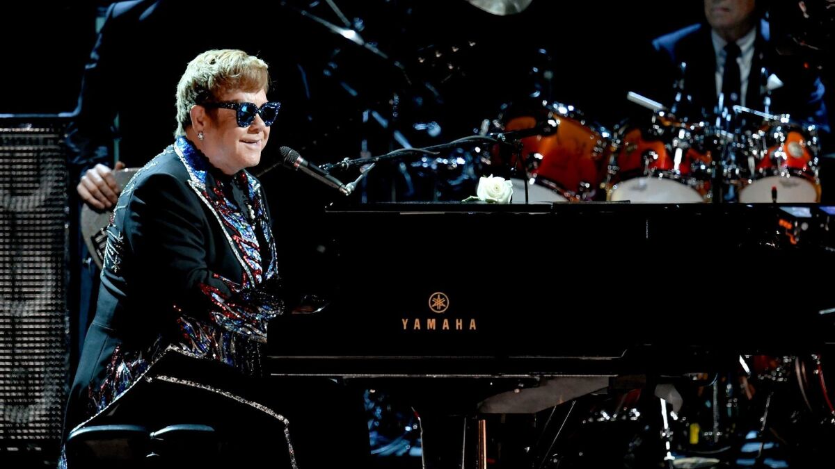 Elton John performs onstage during the Grammy Awards in January.