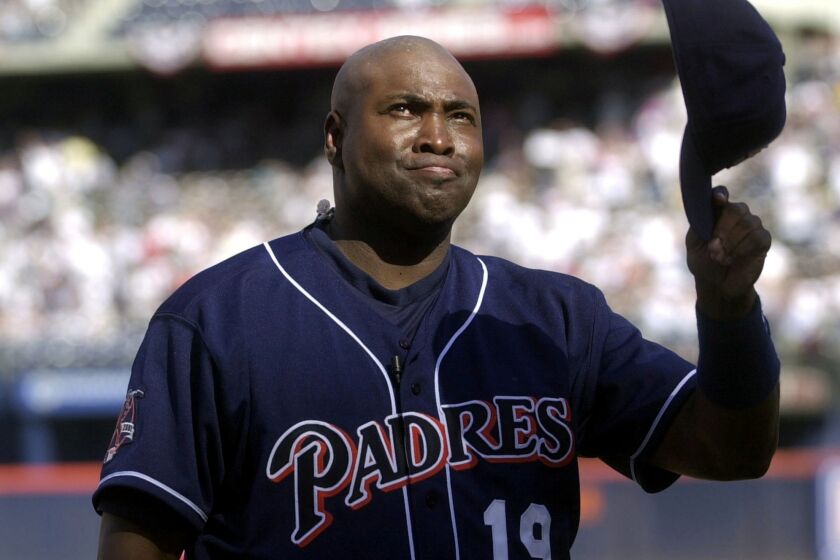 The Padres' Tony Gwynn fights back tears as he acknowledges the standing ovation prior to the Padres' game against the Colorado Rockies in this Oct. 7, 2001 file photo, in San Diego. Gwynn retired after the game.
