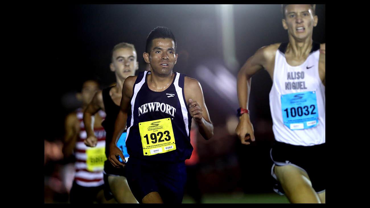 Newport Harbor High School cross country runner Alexis Garcia ran in the sweepstakes individuals race at the 38th annual Woodbridge Cross Country Classic, at SilverLakes Sports Park in Corona on Saturday, Sept. 15, 2018.