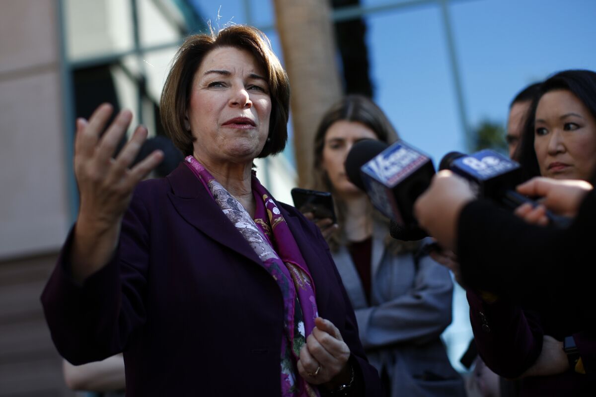 Democratic presidential candidate Sen. Amy Klobuchar, D-Minn., speaks with members of the media after touring the Culinary Health Center, Friday, Feb. 14, 2020, in Las Vegas. (AP Photo/Patrick Semansky)