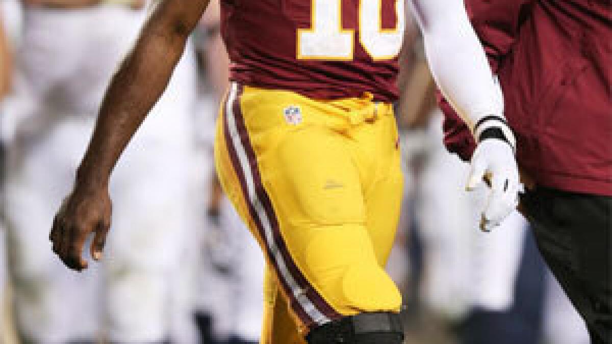 RG3 hurt, Seattle tops Redskins 24-14 in playoffs, Local Sports