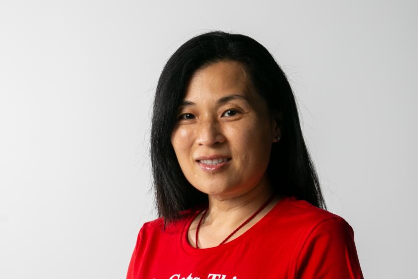 Lily Zhou, a candidate for City Council in District 1, poses for a portrait at The San Diego Union-Tribune's photo studio on October 10, 2019 in San Diego, California.